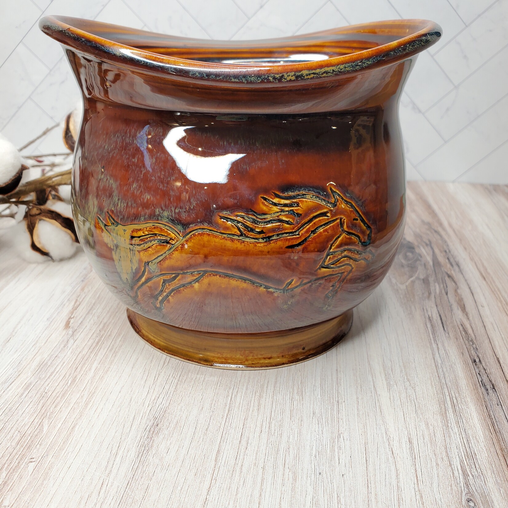 Elaine Randall "Running Free" - vessel with carved horses